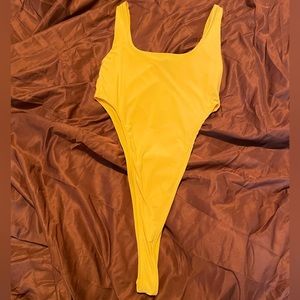 High Cut Yellow Slinky Bodysuit